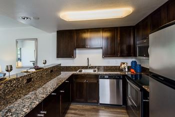Fully furnished kitchen with stainless steel appliances